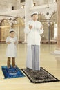 Muslim father praying with his son Royalty Free Stock Photo