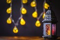 The Muslim feast of the holy month of Ramadan Kareem. Beautiful background with a shining lantern Fanus. Royalty Free Stock Photo