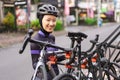 muslim female cyclist unloading her road bicycle on a rack in the back of her car Royalty Free Stock Photo