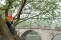 Muslim female student reading a book in nature, outdoor Royalty Free Stock Photo