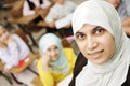 Muslim female teacher in classroom