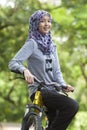 Muslim girl on bicycle