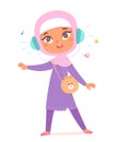 Muslim girl in hijab listening music, young person in headscarf enjoying favorite song Royalty Free Stock Photo