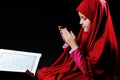 Muslim girl with Holy Koran