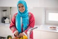 Muslim girl In kitchen