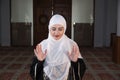 Muslim girl pray in mosque