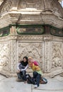 Muslim girls pose for a photo infront of a wall at the magnificent Citadel of Salah Al-Din in Cairo, Egypt.