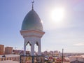 A Muslim golden dome with a crescent moon on the mosque. Minaret against the sky. Arab day. Islamic symbols of religion. Faith in