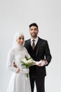 muslim groom holding hand of happy Royalty Free Stock Photo