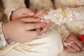 Muslim groom wears the ring bride Royalty Free Stock Photo