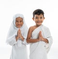 Asian children with ihram islamic traditional white clothes Royalty Free Stock Photo