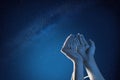 Muslim hands praying with prayer beads at outdoor Royalty Free Stock Photo