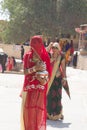 Muslim and Hindu girls with open and veiled faces on street