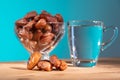 Muslim iftar or breaking of fast food during Ramadan month with close-up on preserved sweet dates. Bowl of dates and