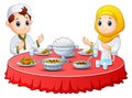 Muslim kid pray together before break fasting Royalty Free Stock Photo