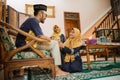family forgiving each other and shake their hand on idul fitri