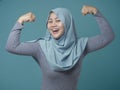 Muslim Lady Shows Strong Muscle Gesture Royalty Free Stock Photo