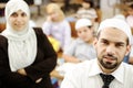 Muslim male and female teachers in classroom