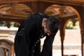 Muslim Man In Dishdasha Is Praying In The Mosque Royalty Free Stock Photo