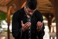 Muslim Man In Dishdasha Praying At Mosque Royalty Free Stock Photo