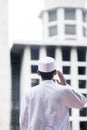 Muslim man doing azan in the mosque Royalty Free Stock Photo