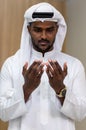 Muslim man having worship .  Muslim man praying in mosque stretching palms up. Moslem pray Royalty Free Stock Photo