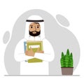 A muslim man holds a stack of books in one hand, a clipboard in the other, space for text. Knowledge, education Royalty Free Stock Photo