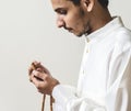 Muslim man with prayer beads Royalty Free Stock Photo