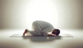 Muslim Man in Prayerful Posture on Prayer Mat Royalty Free Stock Photo