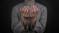 Muslim Man Praying Making Dua with Both Hands and Prayer Beads Royalty Free Stock Photo