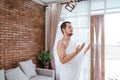 Muslim man praying wearing ihram clothes