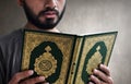 Muslim man reading holy book koran Royalty Free Stock Photo