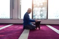 Muslim Man Reading Holy Book Qur`an Inside The Mosque Royalty Free Stock Photo