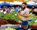 Muslim man selling fruit