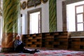 Muslim man sleeping in a mosque in Trabzon