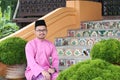 A muslim man with traditional baju melayu Royalty Free Stock Photo