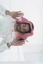 Muslim man doing sujud or sajdah on the glass floor Royalty Free Stock Photo