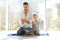 Muslim man and his son praying together Royalty Free Stock Photo