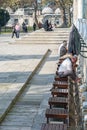 Muslim Men making traditional Ablution at Mosque Outdoor Wall