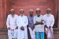 Muslim men standing at Jama Masjid in Delhi, India Royalty Free Stock Photo