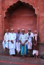 Muslim men standing at Jama Masjid in Delhi, India