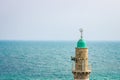 Muslim Minaret tower religion Eastern architecture building on sea waters landscape horizon background scenic view in slightly