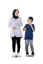 Muslim mother and her child jogging together Royalty Free Stock Photo