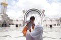 Muslim mother and her son together at a mosque Royalty Free Stock Photo