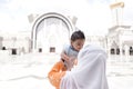Muslim mother and her son together at a mosque Royalty Free Stock Photo