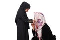 Muslim Mother Kisses Her Daughters Hand To Show Her Love Royalty Free Stock Photo