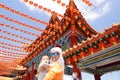 Muslim mother and her son together at a chinese temple Royalty Free Stock Photo