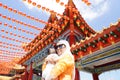 Muslim mother and her son together at a chinese temple Royalty Free Stock Photo