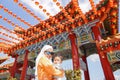 Muslim mother and her son together at a chinese temple Royalty Free Stock Photo