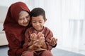Muslim mother and son praying together Royalty Free Stock Photo